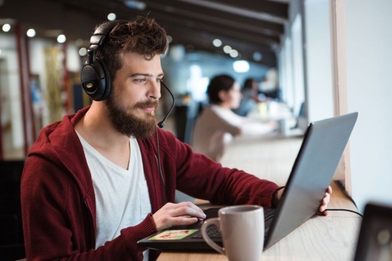 Man on a computer.