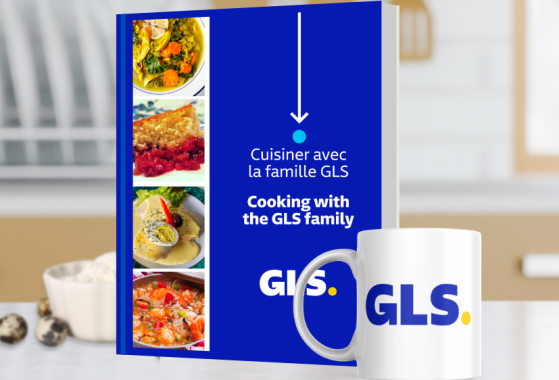 GLS cookbook next to a GLS coffee mug.