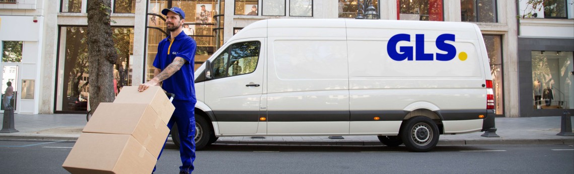 GLS driver transports parcels to a shop