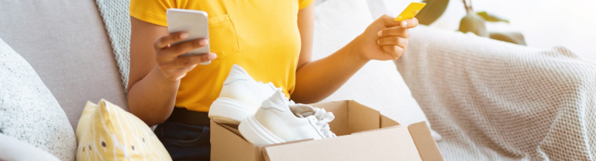 Young woman discovering her online purchase