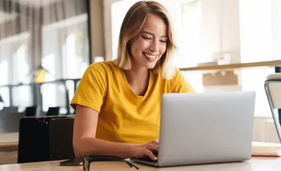 A customer reviewing her shipments from her YourGLS account